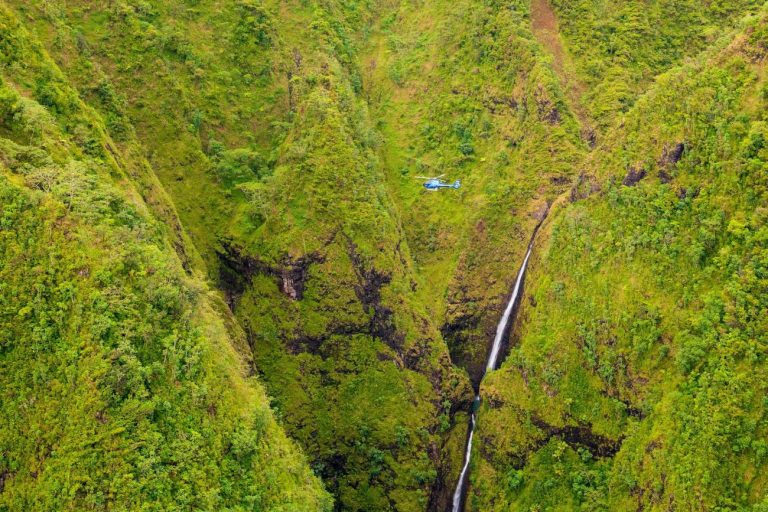 Sacred Falls in the Koolau rainforest seen from an Oahu helicopter tour