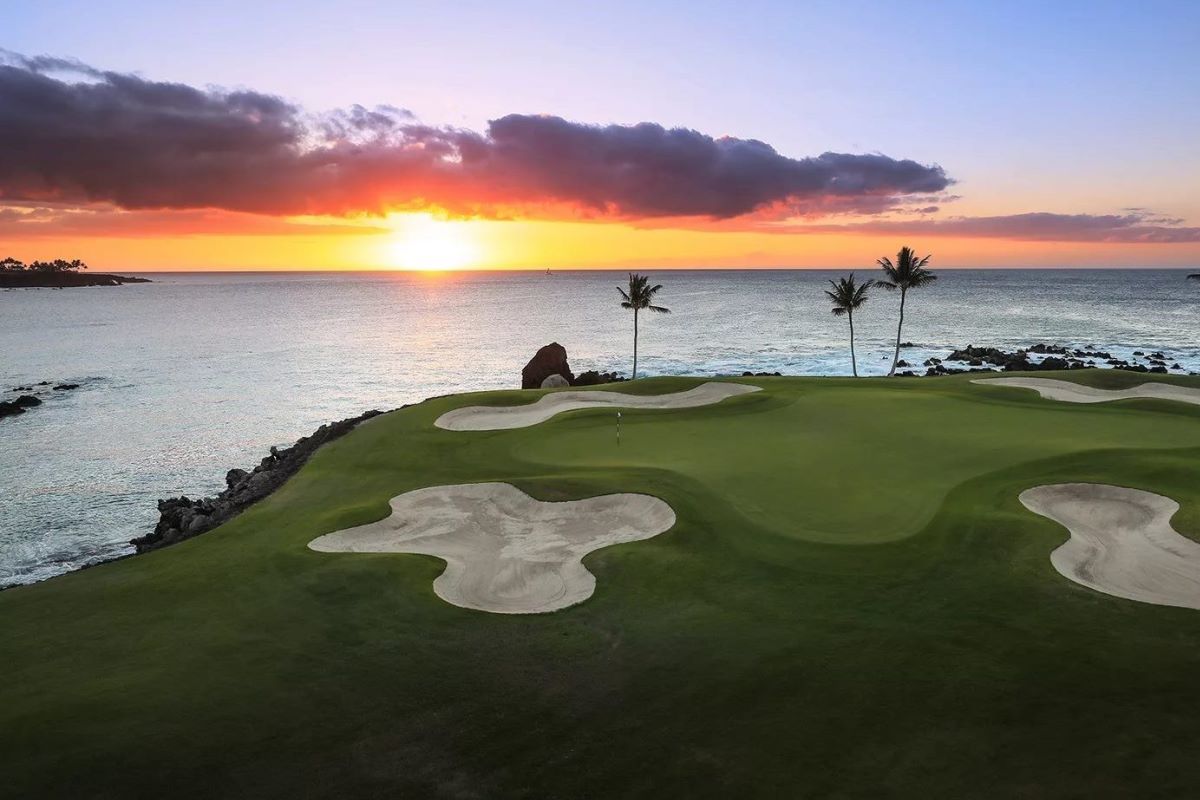 Oceanfront green at Mauna Lani on the Kohala Coast of the Big Island at sunset