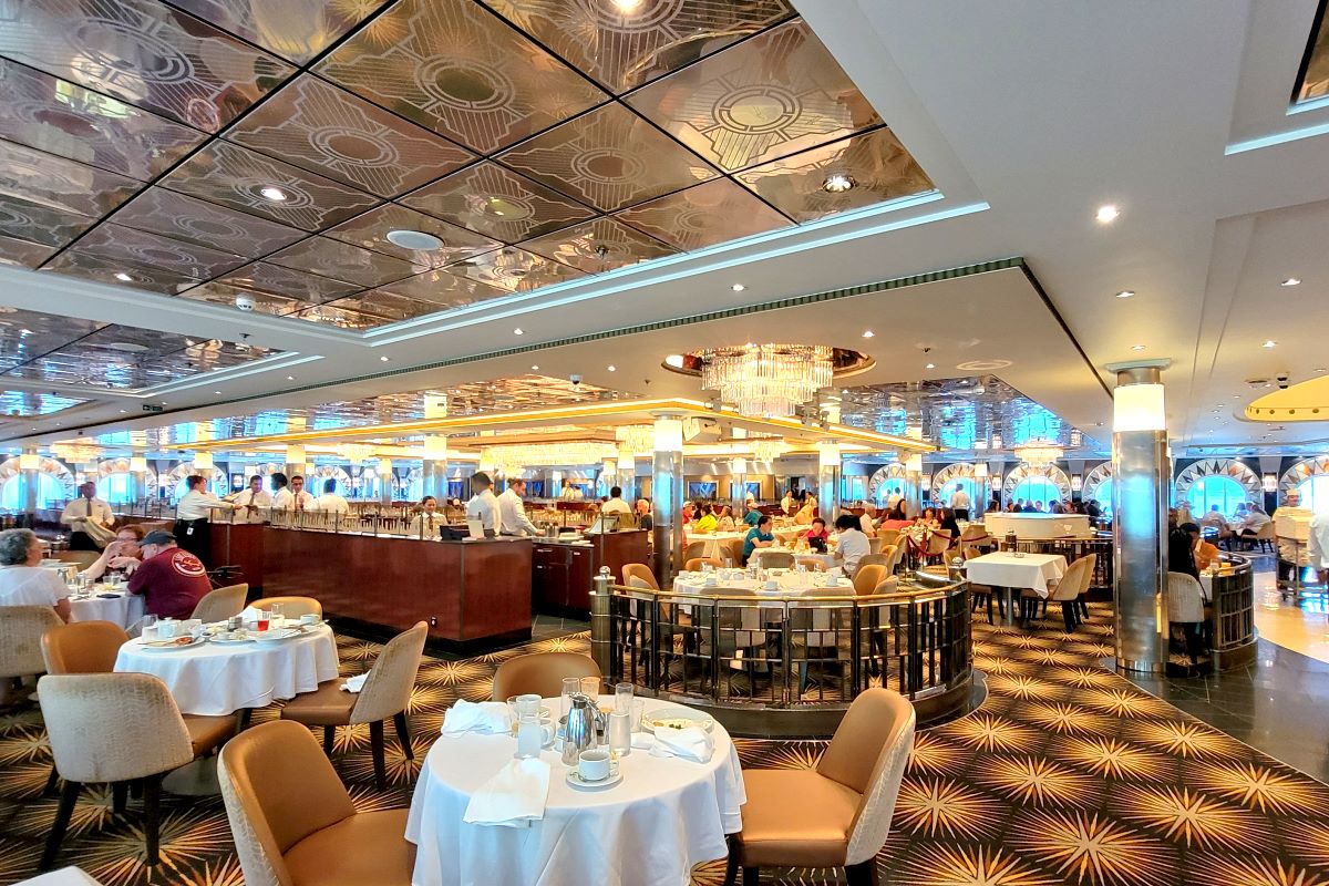 The Skyline main dining room on Pride of America, with its mirrored ceiling and chandeliers