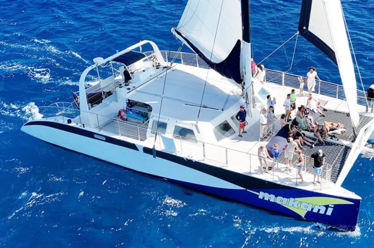 Guests on deck of the Makani catamaran