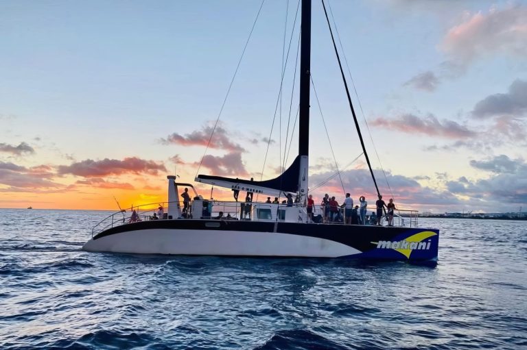 Makani catamaran at sunset off Waikiki